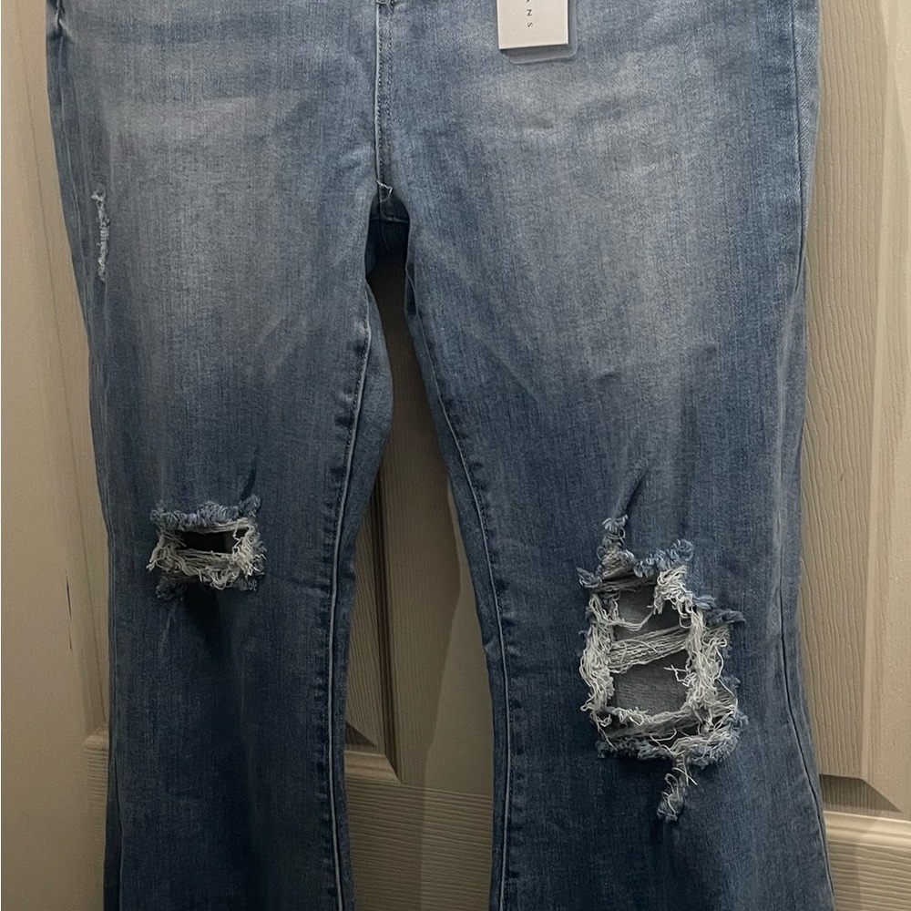 Trendy Distressed Flare Jeans in Blue